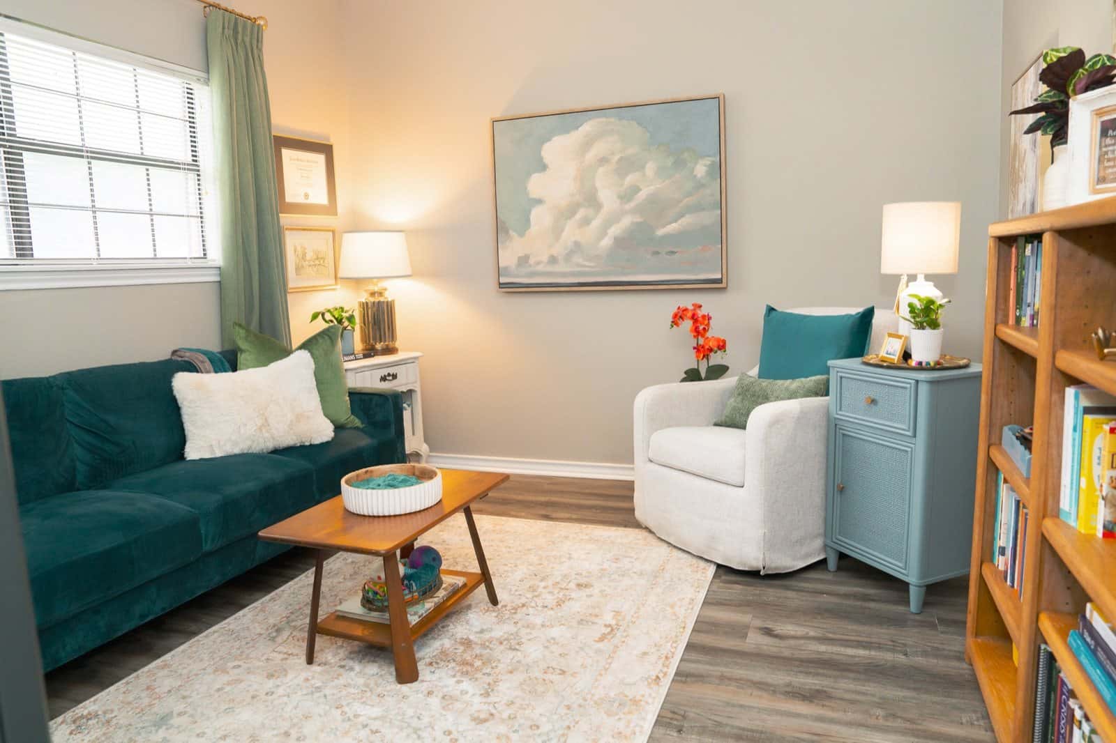 Texarkana Counseling Collective office with counseling seating, books, soft lighting, and turquoise accents.